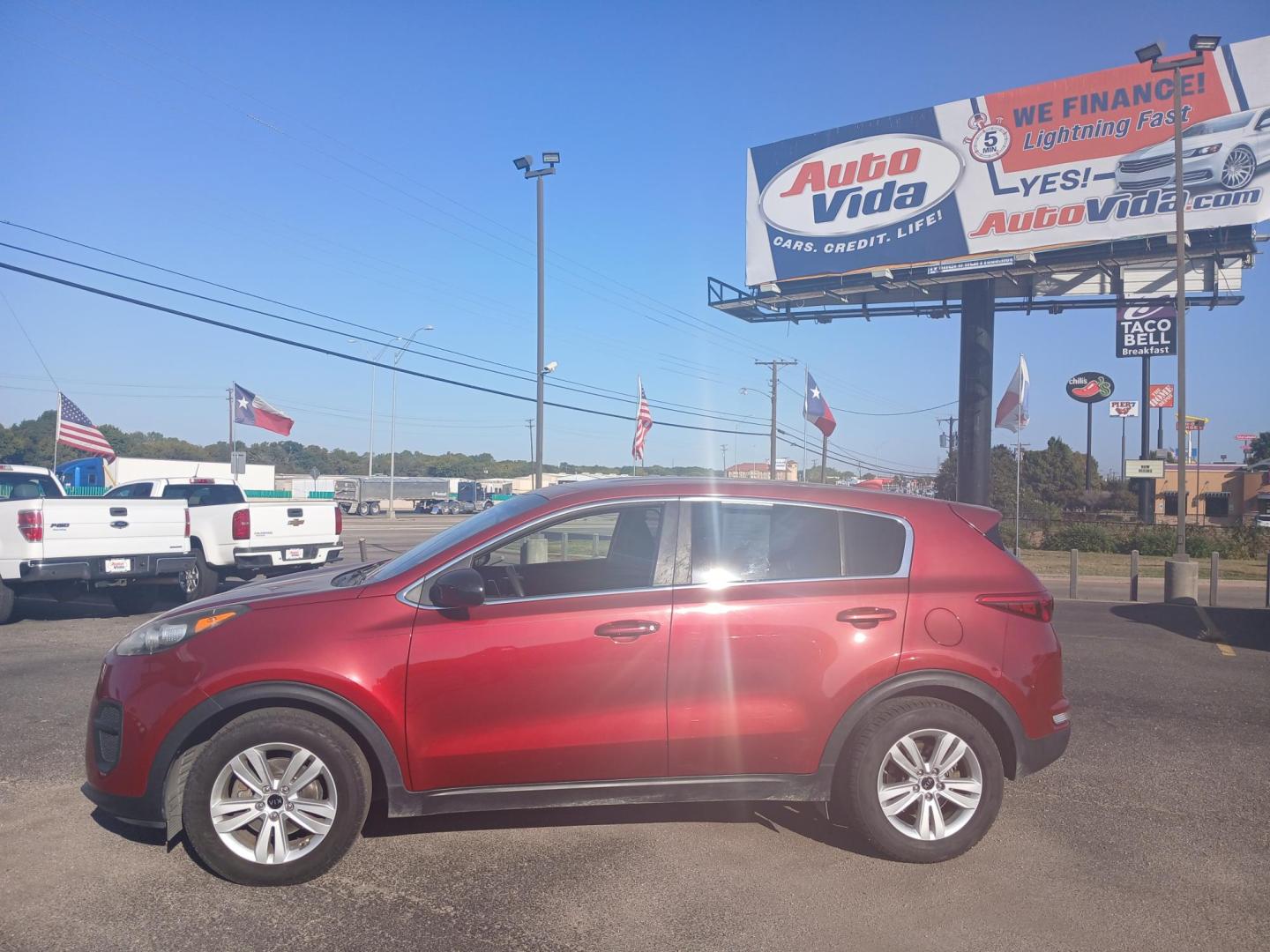 2018 RED Kia Sportage LX FWD (KNDPM3AC6J7) with an 2.4L V6 DOHC 24V engine, 6A transmission, located at 420 I-35E, Lancaster, TX, 75146, (469) 297-4144, 32.593929, -96.823685 - Photo#1