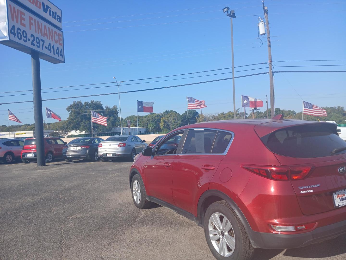 2018 RED Kia Sportage LX FWD (KNDPM3AC6J7) with an 2.4L V6 DOHC 24V engine, 6A transmission, located at 420 I-35E, Lancaster, TX, 75146, (469) 297-4144, 32.593929, -96.823685 - Photo#2