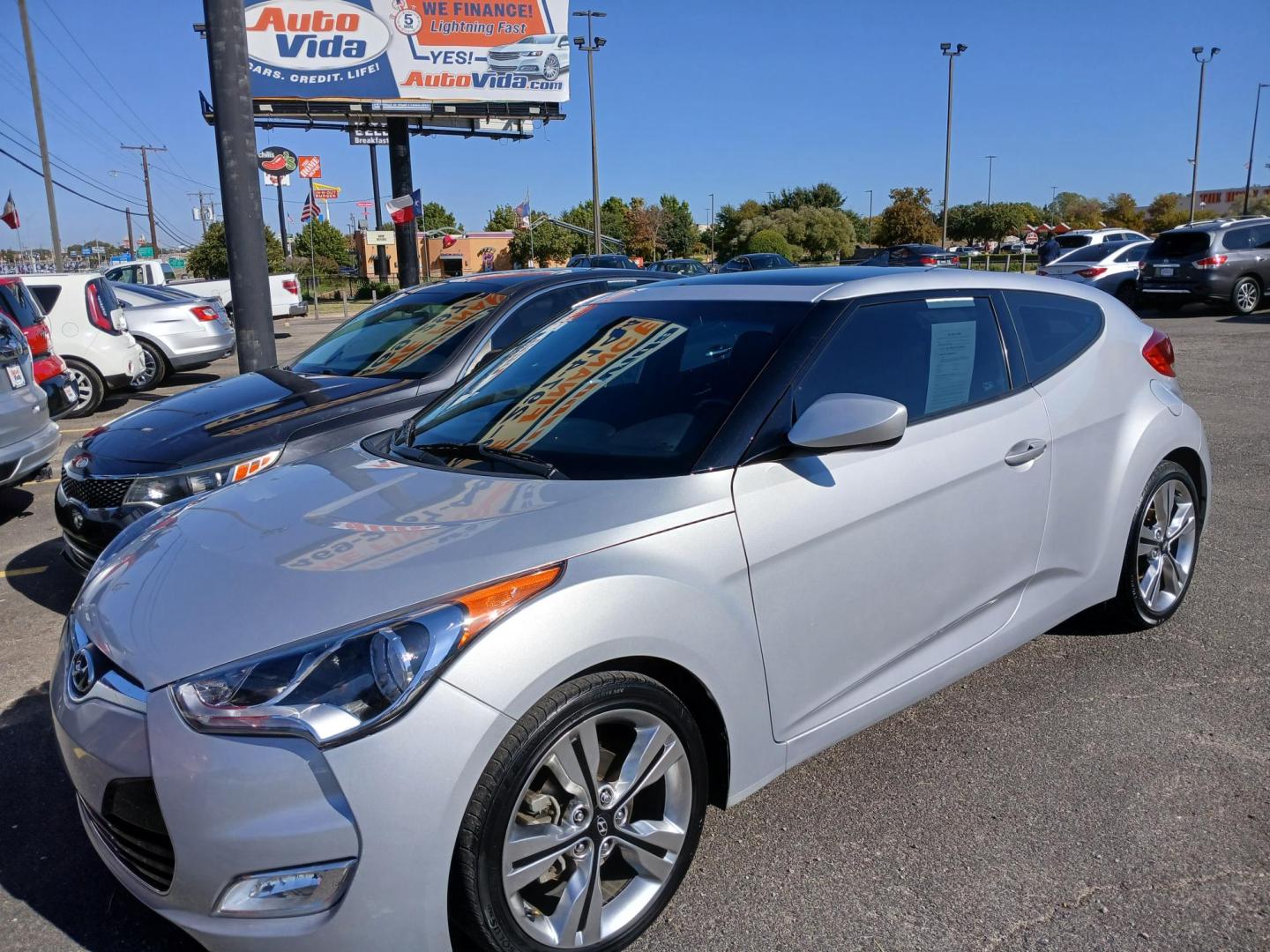 2016 SILVER Hyundai Veloster Base 6MT (KMHTC6AD9GU) with an 1.6L L4 DOHC 16V engine, 6-Speed Manual transmission, located at 420 I-35E, Lancaster, TX, 75146, (469) 297-4144, 32.593929, -96.823685 - Photo#0