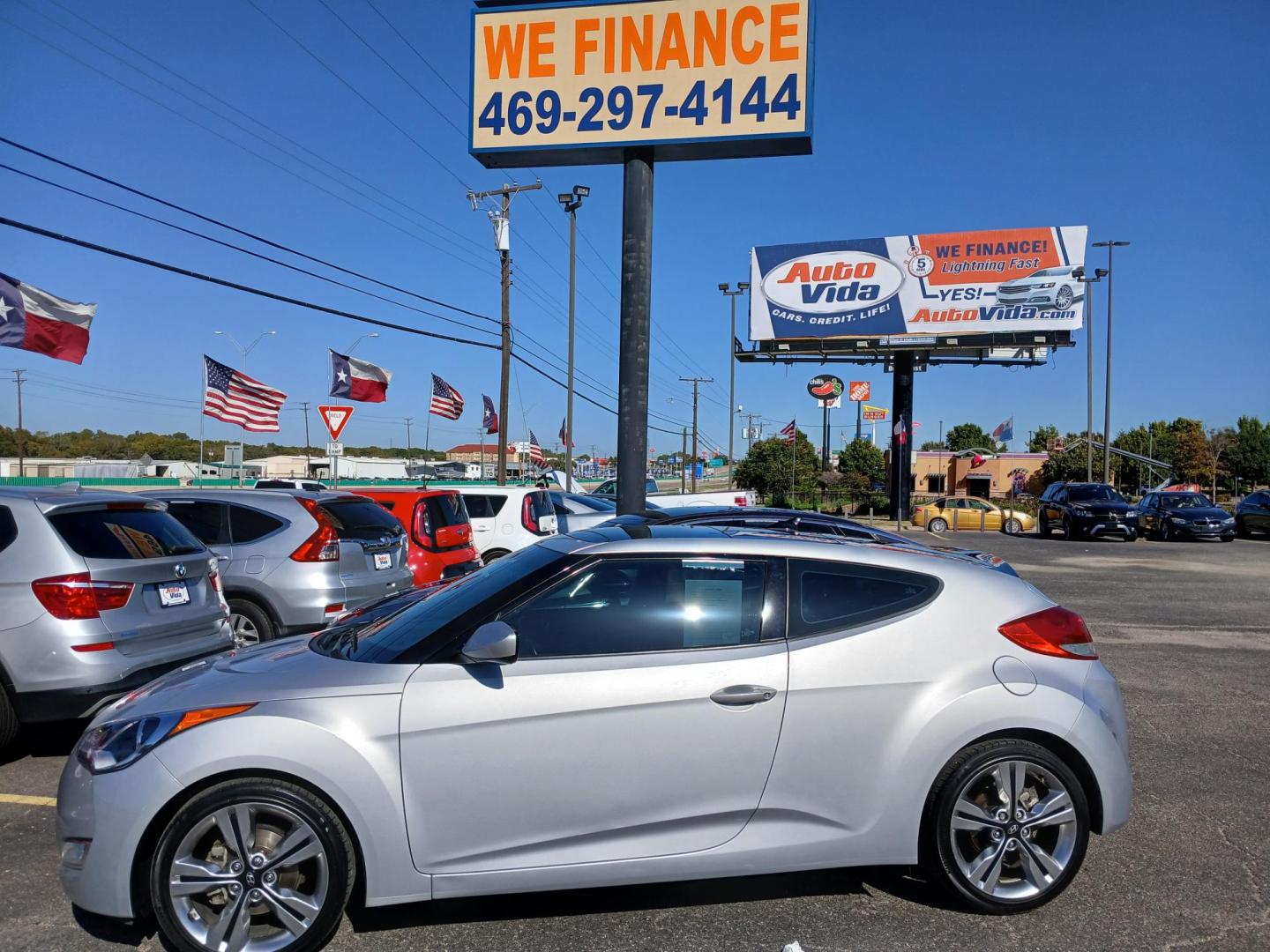 2016 SILVER Hyundai Veloster Base 6MT (KMHTC6AD9GU) with an 1.6L L4 DOHC 16V engine, 6-Speed Manual transmission, located at 420 I-35E, Lancaster, TX, 75146, (469) 297-4144, 32.593929, -96.823685 - Photo#1