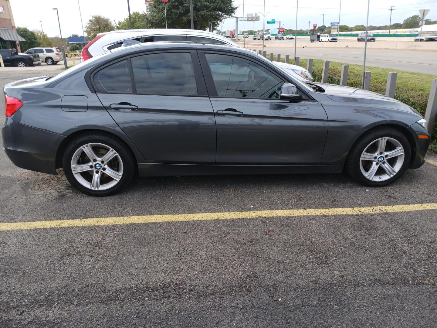 2015 GRAY BMW 3-Series 320i xDrive (WBA3C3G5XFN) with an 2.0L L4 DOHC 16V engine, 8A transmission, located at 420 I-35E, Lancaster, TX, 75146, (469) 297-4144, 32.593929, -96.823685 - Photo#0