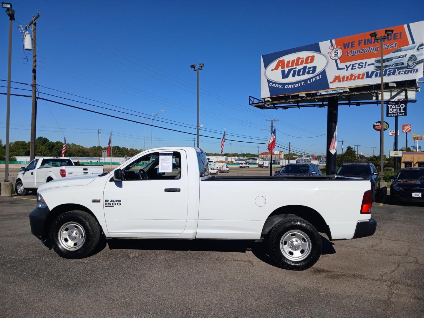 2019 WHITE RAM 1500 Classic Tradesman Regular Cab LWB 4WD (3C6JR7DT3KG) with an 5.7L V8 OHV 16V engine, 8A transmission, located at 420 I-35E, Lancaster, TX, 75146, (469) 297-4144, 32.593929, -96.823685 - Photo#2