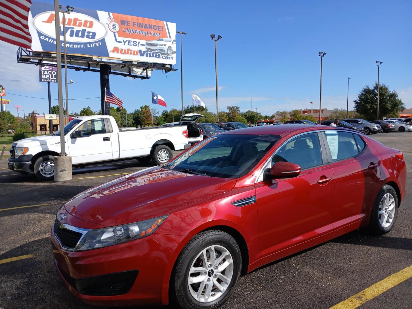 2011 RED Kia Optima EX (KNAGM4A79B5) with an 2.4L L4 DOHC 16V engine, 6-Speed Automatic transmission, located at 420 I-35E, Lancaster, TX, 75146, (469) 297-4144, 32.593929, -96.823685 - Photo#0