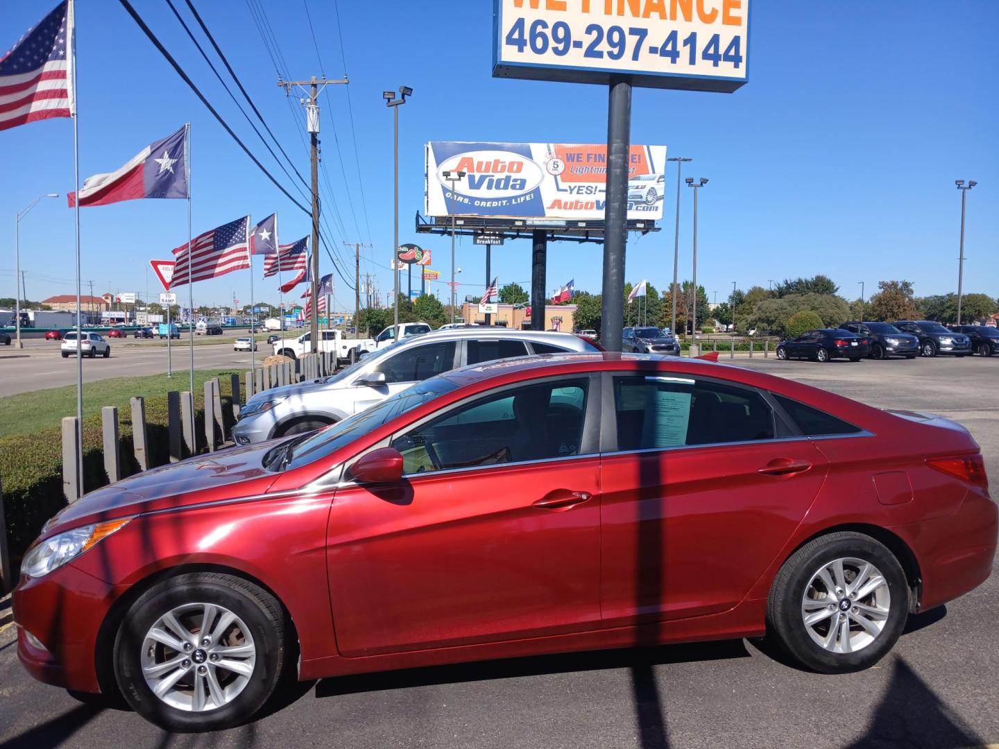 2013 RED Hyundai Sonata GLS (5NPEB4ACXDH) with an 2.4L L4 DOHC 16V engine, 6-Speed Automatic transmission, located at 420 I-35E, Lancaster, TX, 75146, (469) 297-4144, 32.593929, -96.823685 - Photo#1