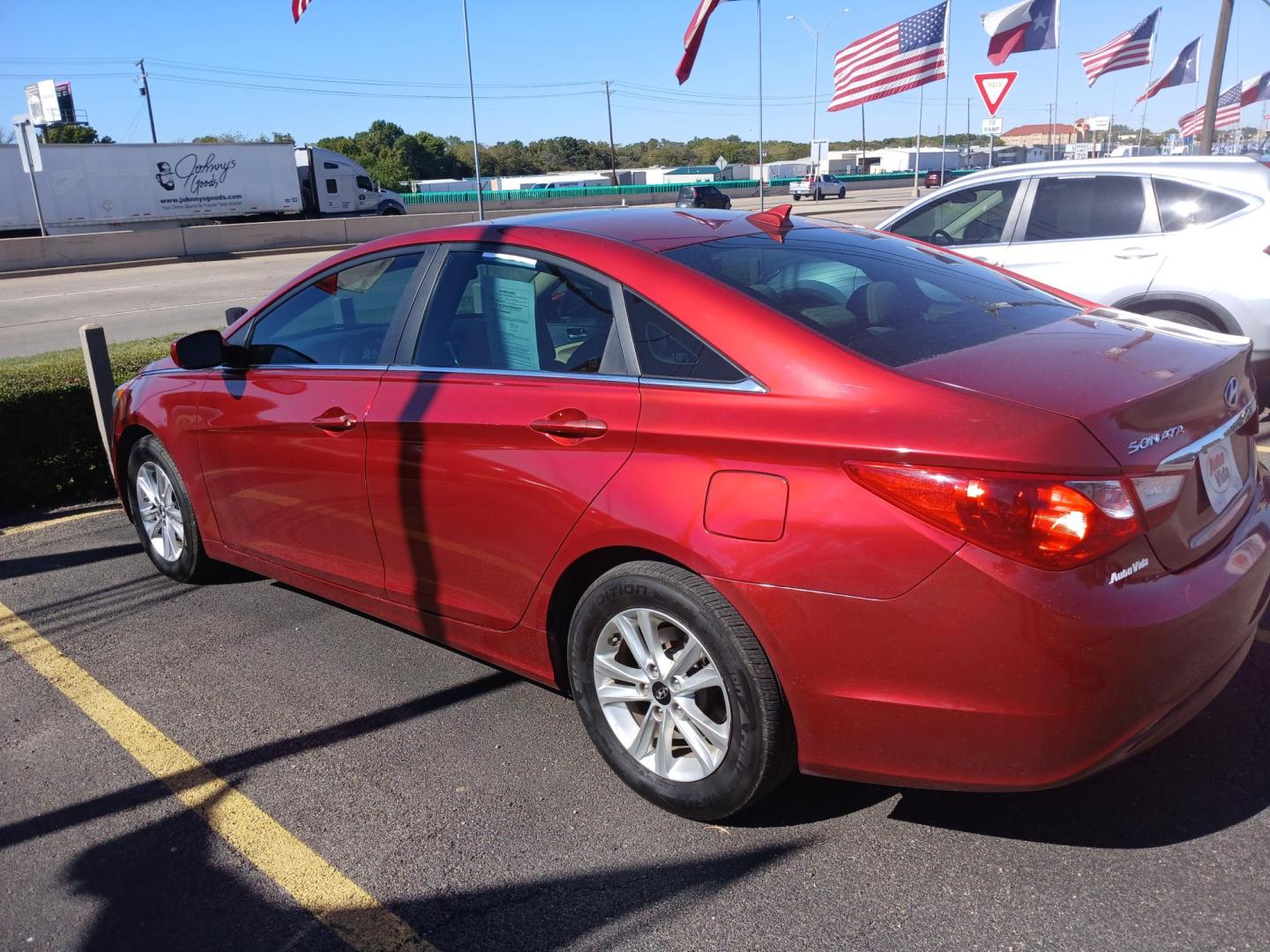 2013 RED Hyundai Sonata GLS (5NPEB4ACXDH) with an 2.4L L4 DOHC 16V engine, 6-Speed Automatic transmission, located at 420 I-35E, Lancaster, TX, 75146, (469) 297-4144, 32.593929, -96.823685 - Photo#2