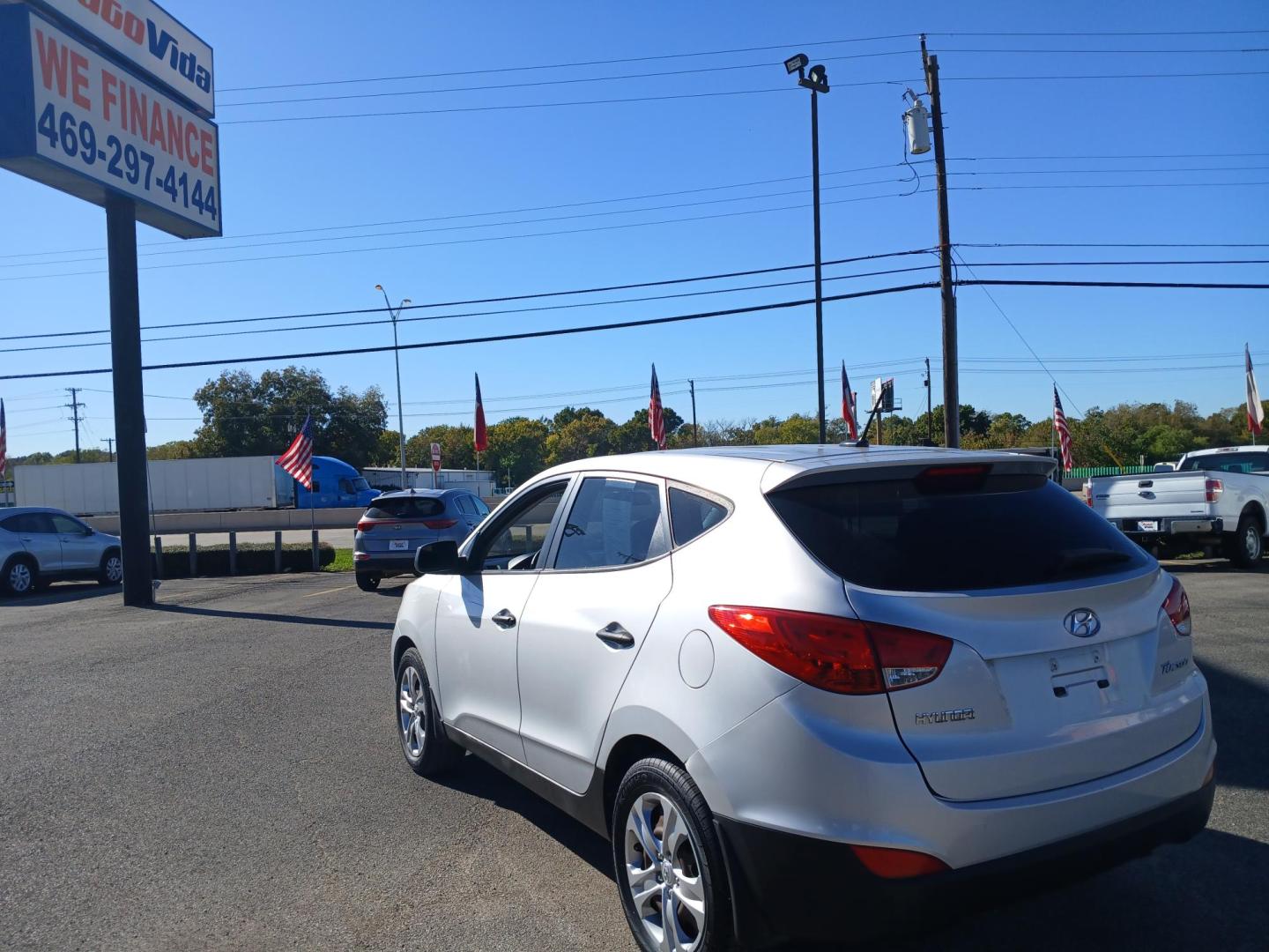 2014 BLACK Hyundai Tucson GL Auto FWD (KM8JT3AF7EU) with an 2.0L L4 DOHC 16V engine, 6-Speed Automatic transmission, located at 420 I-35E, Lancaster, TX, 75146, (469) 297-4144, 32.593929, -96.823685 - Photo#2