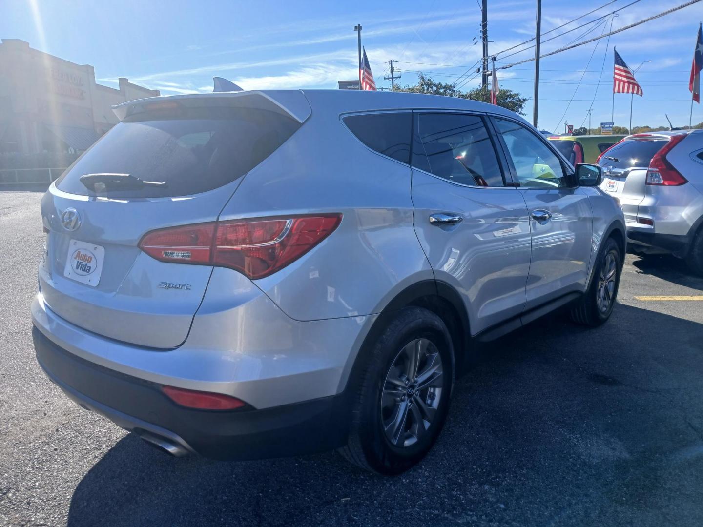 2016 SILVER Hyundai Santa Fe Sport 2.4 FWD (5XYZT3LB8GG) with an 2.4L L4 DOHC 16V engine, 6-Speed Automatic transmission, located at 420 I-35E, Lancaster, TX, 75146, (469) 297-4144, 32.593929, -96.823685 - Photo#1