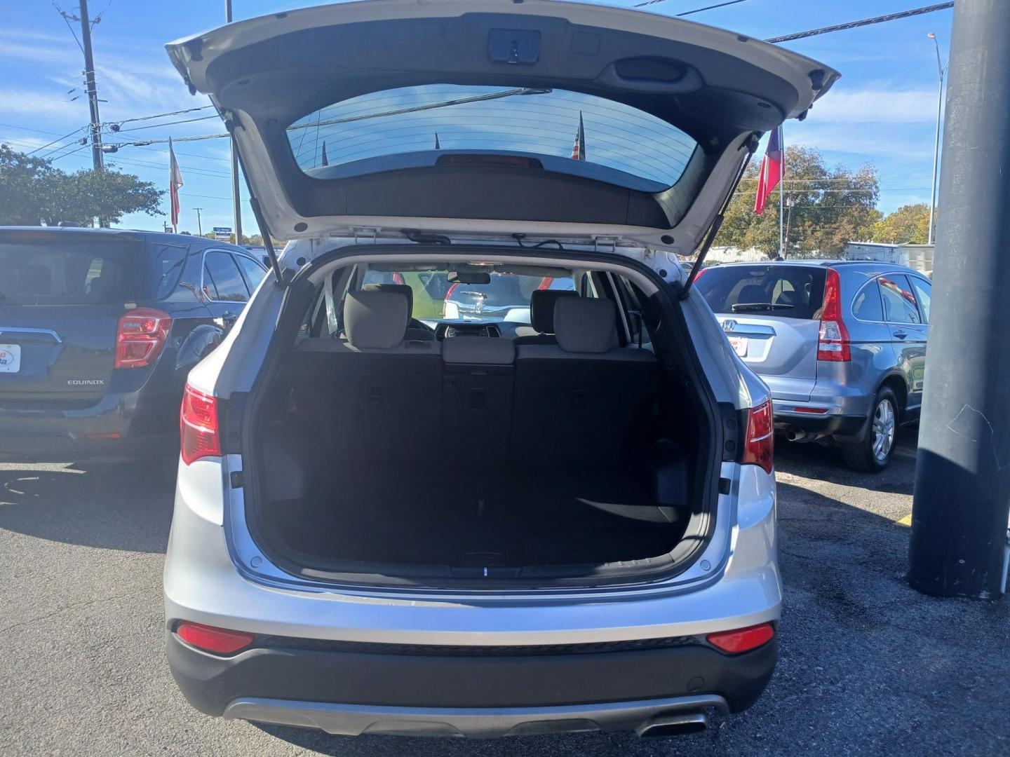 2016 SILVER Hyundai Santa Fe Sport 2.4 FWD (5XYZT3LB8GG) with an 2.4L L4 DOHC 16V engine, 6-Speed Automatic transmission, located at 420 I-35E, Lancaster, TX, 75146, (469) 297-4144, 32.593929, -96.823685 - Photo#2