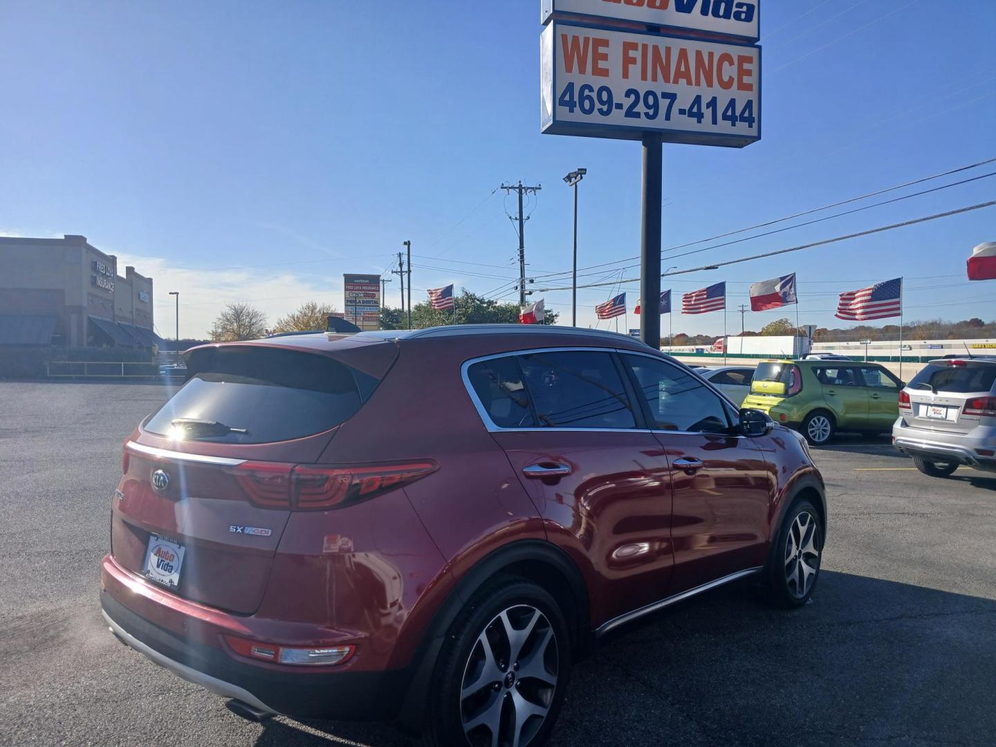 2017 RED Kia Sportage SX FWD (KNDPR3A67H7) with an 2.0L L4 DOHC 16V engine, 6A transmission, located at 420 I-35E, Lancaster, TX, 75146, (469) 297-4144, 32.593929, -96.823685 - Photo#2