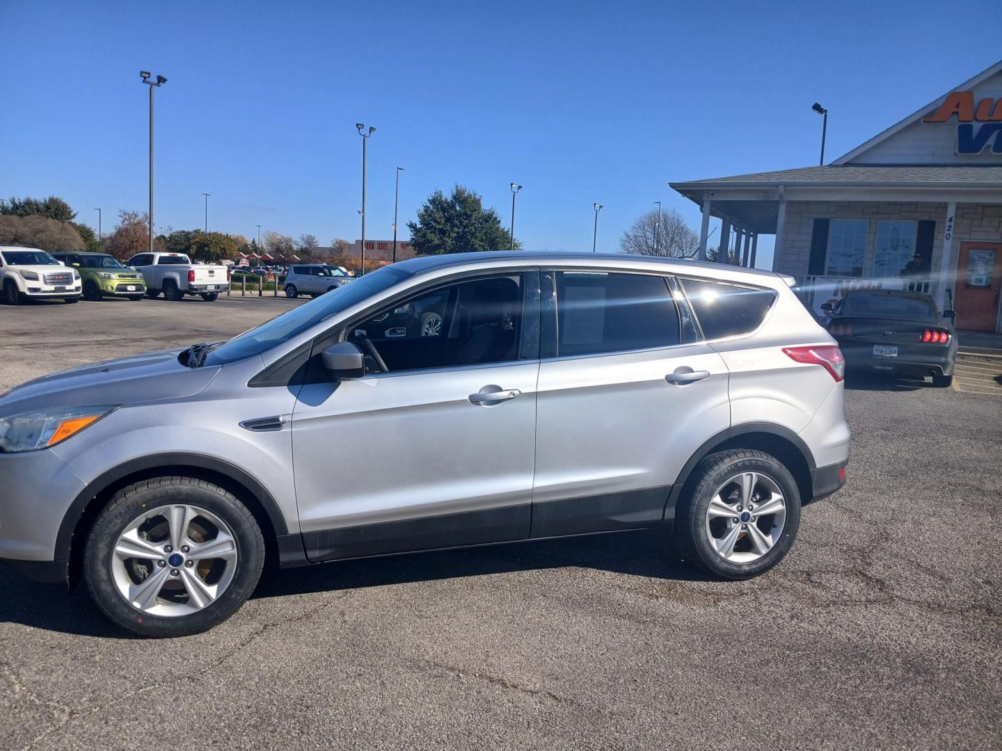 2014 SILVER Ford Escape SE FWD (1FMCU0GX7EU) with an 1.6L L4 DOHC 16V engine, 6-Speed Automatic transmission, located at 420 I-35E, Lancaster, TX, 75146, (469) 297-4144, 32.593929, -96.823685 - Photo#1