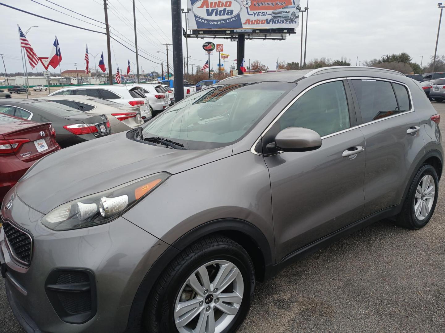 2015 SILVER Kia Sportage LX FWD (KNDPB3AC4F7) with an 2.4L V6 DOHC 24V engine, 6-Speed Automatic transmission, located at 420 I-35E, Lancaster, TX, 75146, (469) 297-4144, 32.593929, -96.823685 - Photo#0