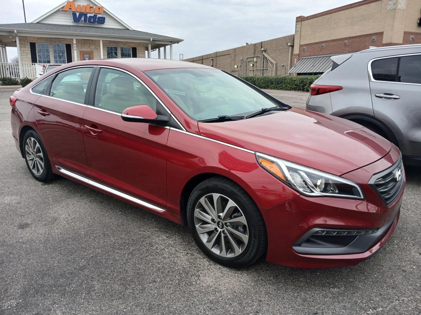 2015 RED Hyundai Sonata Sport (5NPE34AF8FH) with an 2.4L L4 DOHC 16V engine, 6-Speed Automatic transmission, located at 420 I-35E, Lancaster, TX, 75146, (469) 297-4144, 32.593929, -96.823685 - Photo#0