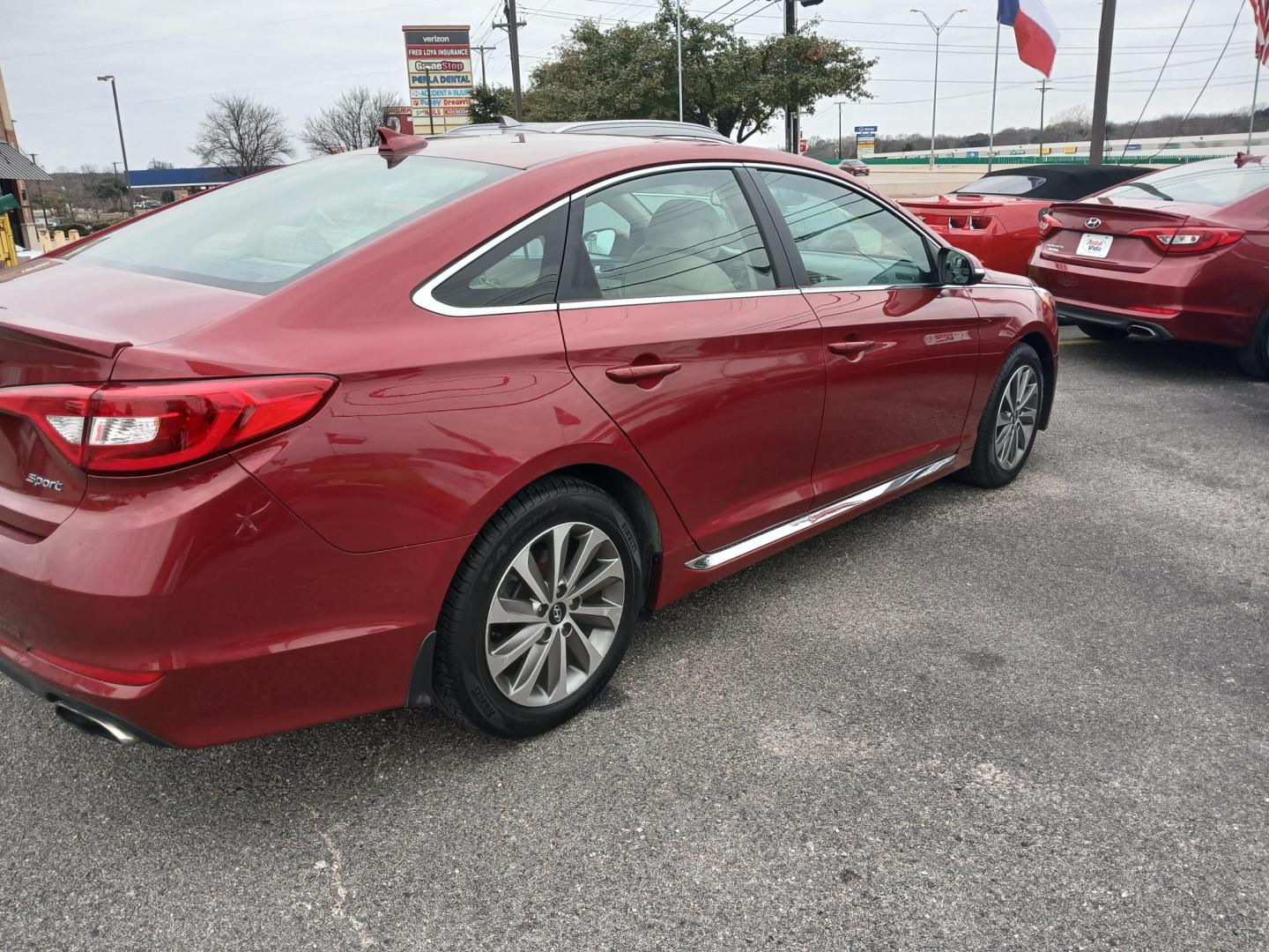 2015 RED Hyundai Sonata Sport (5NPE34AF8FH) with an 2.4L L4 DOHC 16V engine, 6-Speed Automatic transmission, located at 420 I-35E, Lancaster, TX, 75146, (469) 297-4144, 32.593929, -96.823685 - Photo#2