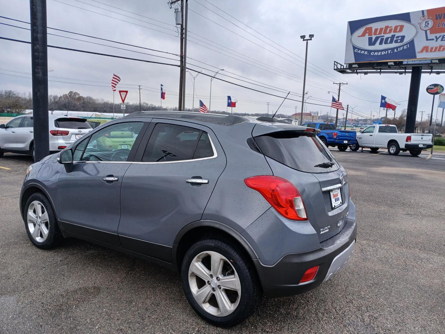 2015 GRAY Buick Encore Convenience FWD (KL4CJBSBXFB) with an 1.4L L4 DOHC 16V TURBO engine, 6-Speed Automatic transmission, located at 420 I-35E, Lancaster, TX, 75146, (469) 297-4144, 32.593929, -96.823685 - Photo#2