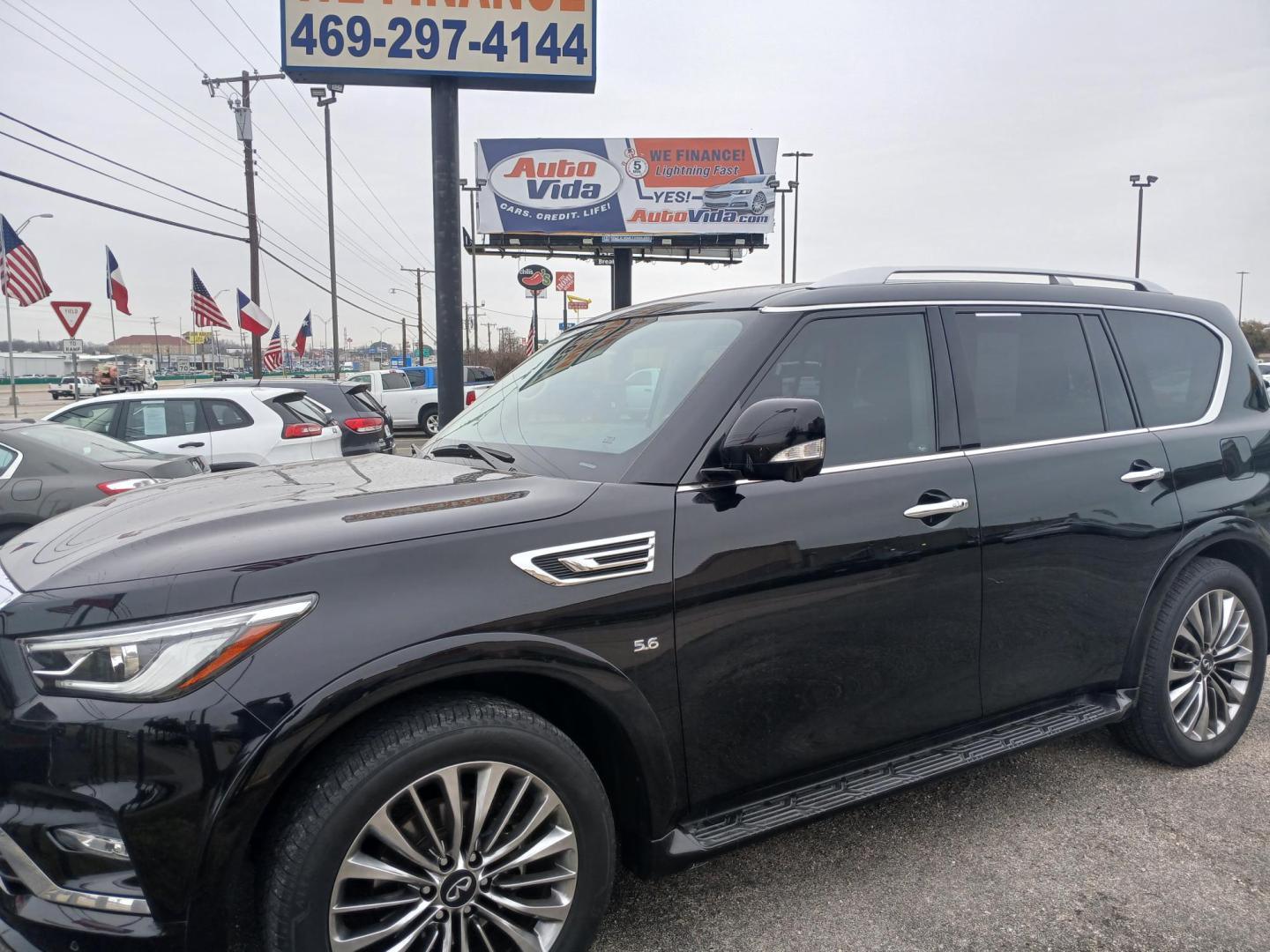 2018 BLACK Infiniti QX80 2WD (JN8AZ2NF5J9) with an 5.6L V8 DOHC 32V engine, 7A transmission, located at 420 I-35E, Lancaster, TX, 75146, (469) 297-4144, 32.593929, -96.823685 - Photo#0