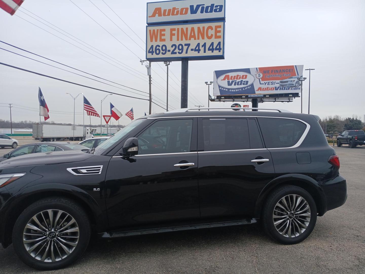 2018 BLACK Infiniti QX80 2WD (JN8AZ2NF5J9) with an 5.6L V8 DOHC 32V engine, 7A transmission, located at 420 I-35E, Lancaster, TX, 75146, (469) 297-4144, 32.593929, -96.823685 - Photo#1