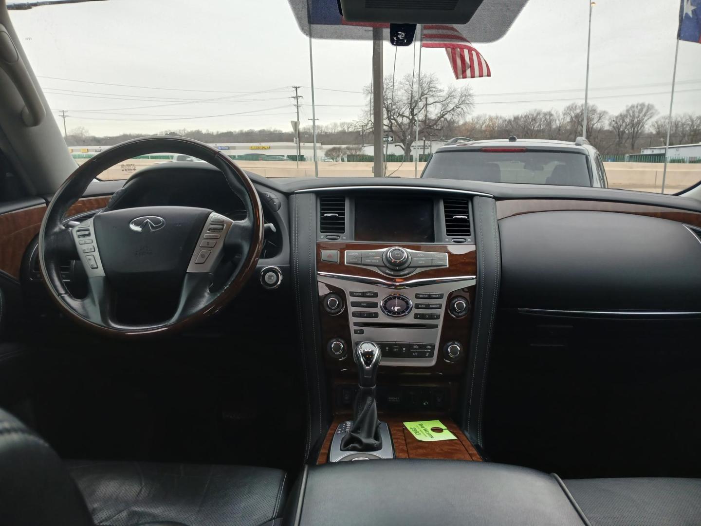 2018 BLACK Infiniti QX80 2WD (JN8AZ2NF5J9) with an 5.6L V8 DOHC 32V engine, 7A transmission, located at 420 I-35E, Lancaster, TX, 75146, (469) 297-4144, 32.593929, -96.823685 - Photo#4