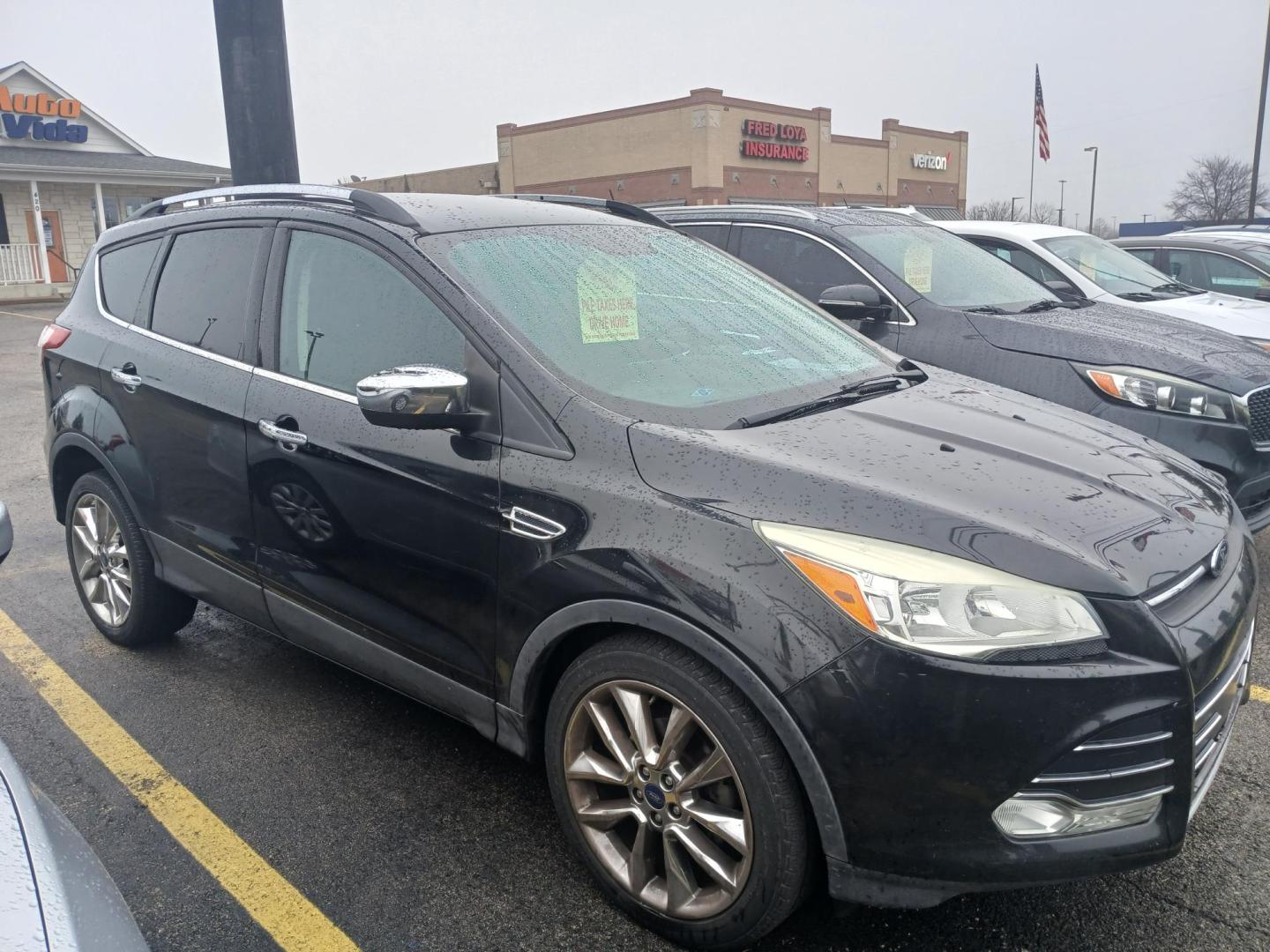 2015 BLACK Ford Escape SE FWD (1FMCU0GX8FU) with an 1.6L L4 DOHC 16V engine, 6-Speed Automatic transmission, located at 420 I-35E, Lancaster, TX, 75146, (469) 297-4144, 32.593929, -96.823685 - Photo#0