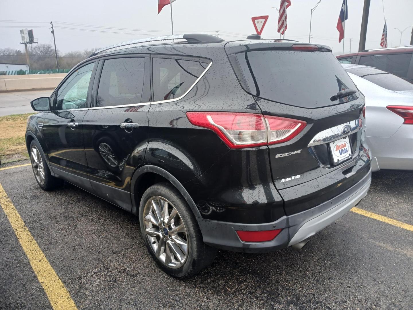 2015 BLACK Ford Escape SE FWD (1FMCU0GX8FU) with an 1.6L L4 DOHC 16V engine, 6-Speed Automatic transmission, located at 420 I-35E, Lancaster, TX, 75146, (469) 297-4144, 32.593929, -96.823685 - Photo#1