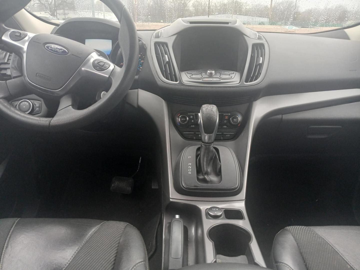 2015 BLACK Ford Escape SE FWD (1FMCU0GX8FU) with an 1.6L L4 DOHC 16V engine, 6-Speed Automatic transmission, located at 420 I-35E, Lancaster, TX, 75146, (469) 297-4144, 32.593929, -96.823685 - Photo#3