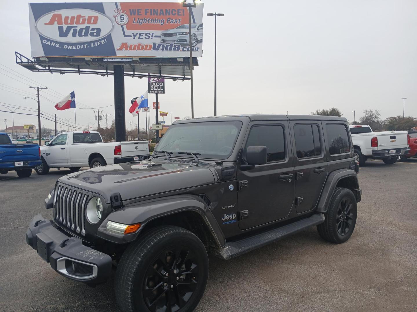 2021 GRAY Jeep Wrangler Unlimited Sahara 4XE (1C4JJXP60MW) with an 2.0L L4 DOHC 16V HYBRID engine, 8A transmission, located at 420 I-35E, Lancaster, TX, 75146, (469) 297-4144, 32.593929, -96.823685 - Photo#0