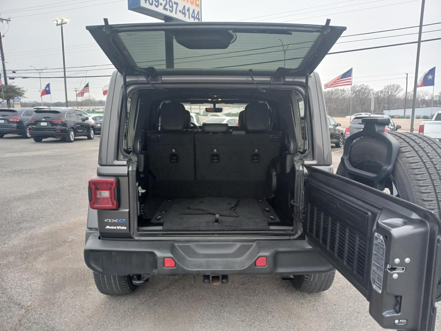 2021 GRAY Jeep Wrangler Unlimited Sahara 4XE (1C4JJXP60MW) with an 2.0L L4 DOHC 16V HYBRID engine, 8A transmission, located at 420 I-35E, Lancaster, TX, 75146, (469) 297-4144, 32.593929, -96.823685 - Photo#5