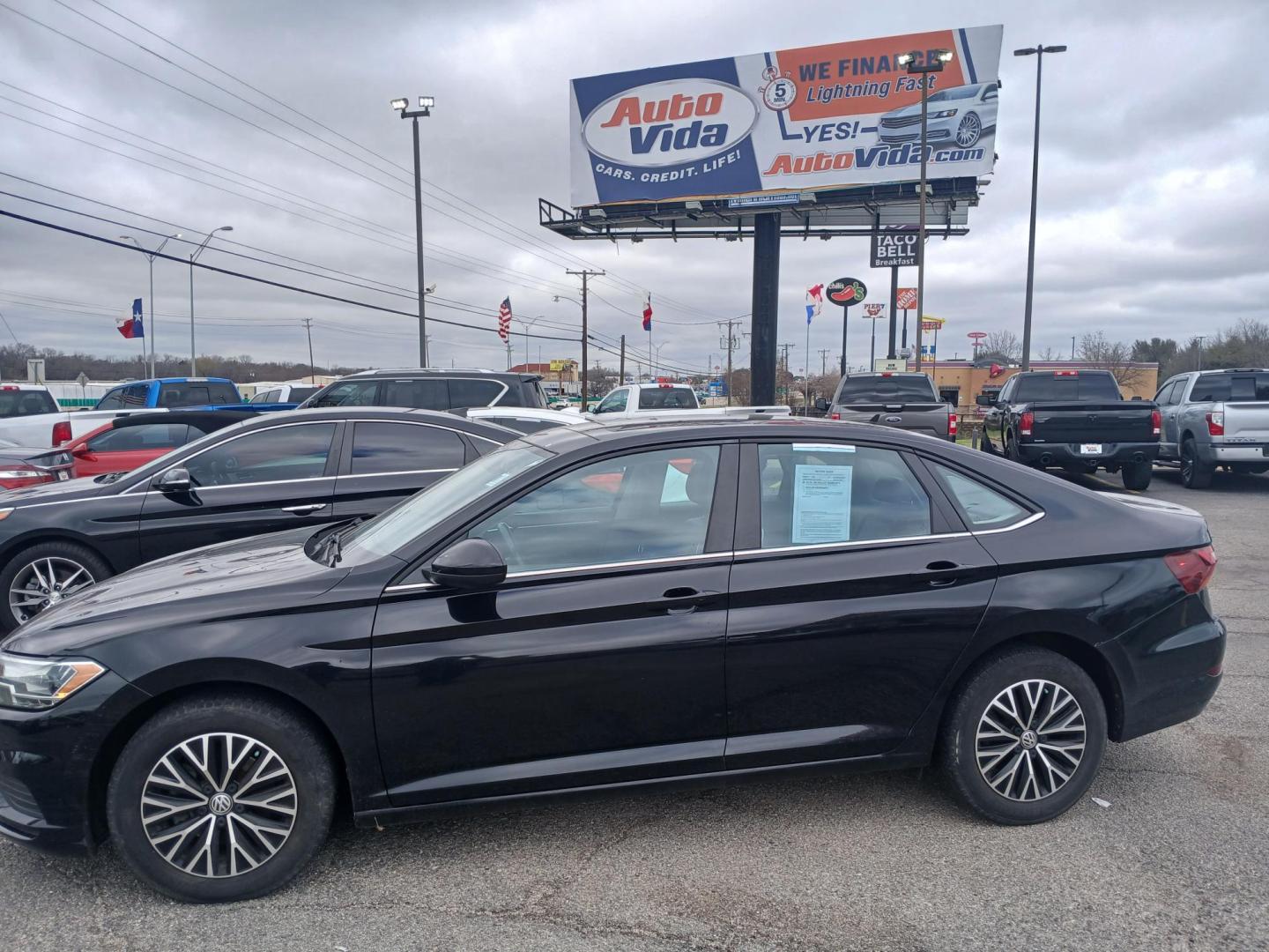 2019 BLACK Volkswagen Jetta 1.4T SE 8A (3VWC57BUXKM) with an 1.4L L4 DOHC 20V engine, 8A transmission, located at 420 I-35E, Lancaster, TX, 75146, (469) 297-4144, 32.593929, -96.823685 - Photo#0