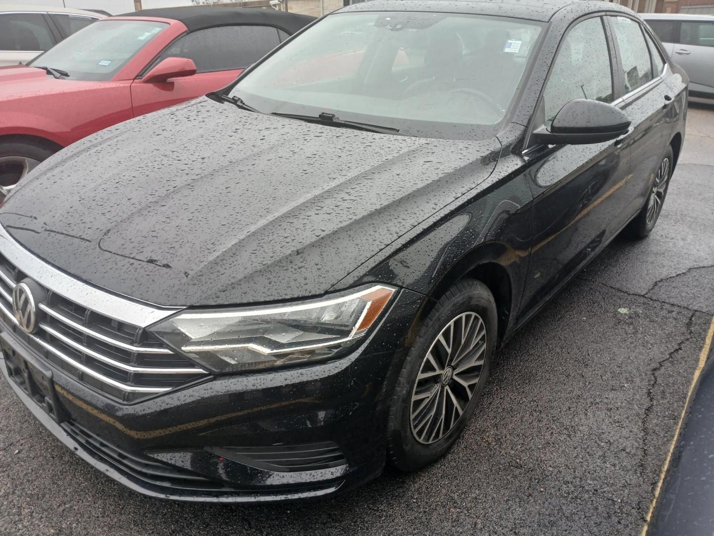 2019 BLACK Volkswagen Jetta 1.4T SE 8A (3VWC57BUXKM) with an 1.4L L4 DOHC 20V engine, 8A transmission, located at 420 I-35E, Lancaster, TX, 75146, (469) 297-4144, 32.593929, -96.823685 - Photo#2