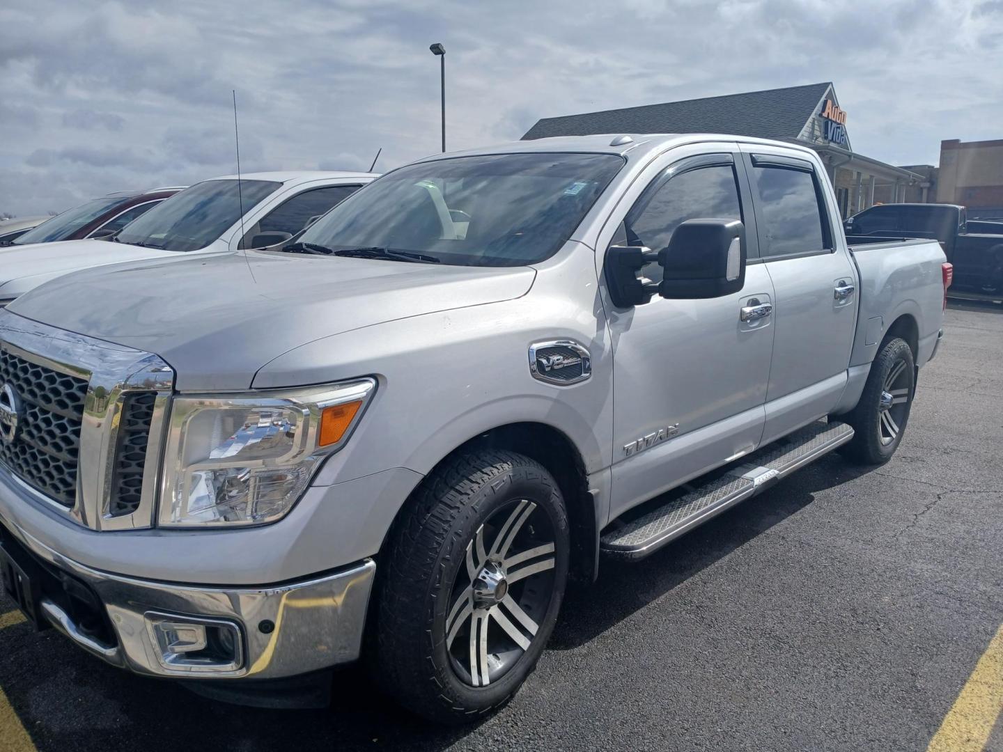 2017 SILVER Nissan Titan S Crew Cab 2WD (1N6AA1E68HN) with an 5.6L V8 DOHC 32V engine, 6A transmission, located at 420 I-35E, Lancaster, TX, 75146, (469) 297-4144, 32.593929, -96.823685 - Photo#0